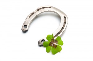 Horseshoes and clover with four leaf
